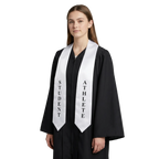 White Student Athlete graduation stole with embroidered lettering, worn over a graduation gown
